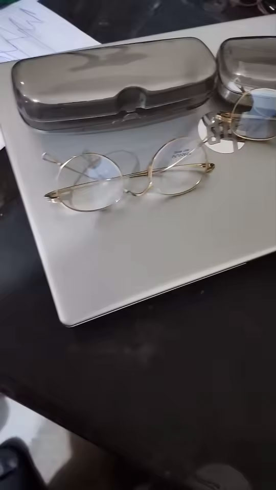 Photo from Priya K., Queens, NY review of AZUMI Unisex 100% Titanium Oval Eyeglass Frames