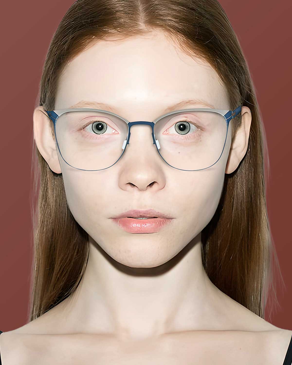 Unibody titanium eyeglass frames showing a seamless, screwless structural chassis design.